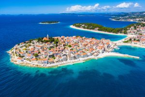 aerial view of primosten old town, amazing sunny landscape, dalmatia, croatia. famous tourist resort on adriatic sea coast.