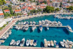 aerial view of baska voda town with harbor in makarska riviera, dalmatia, croatia