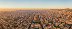 aerial panorama drone shot of barcelona city church in construction in sunrise hour in spain winter